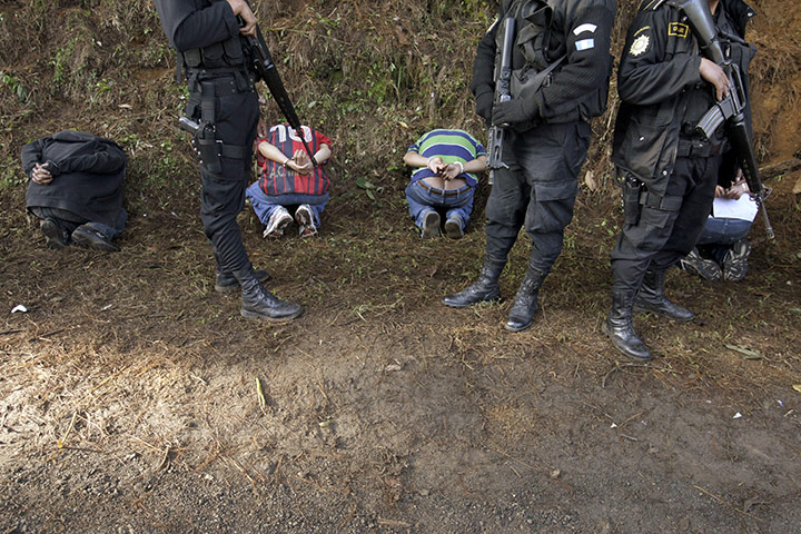 Guatemala gang wars: Suspected members of the Zeta drug cartel near Coban