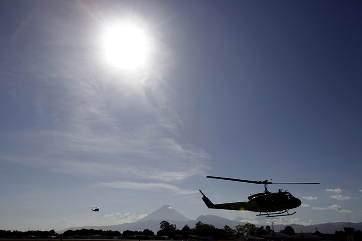 Guatemala gang wars: Helicopters carrying suspected members of the Zetas gang