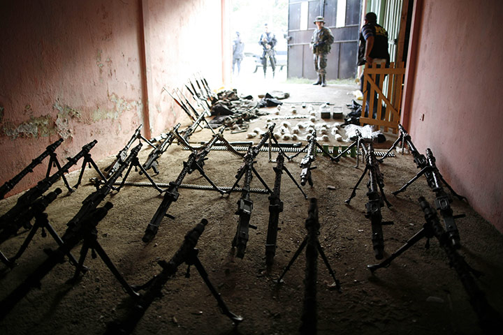 Guatemala gang wars: Weapons seized during a police and military raid