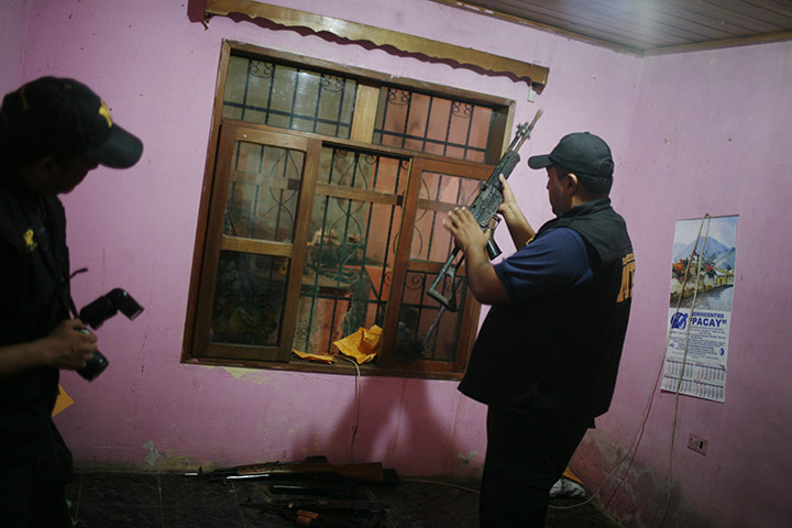 Guatemala gang wars: Weapons found during a police raid