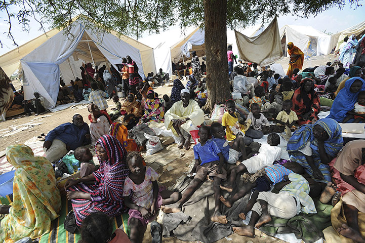 Southern Sudan: Residents gather outside UNMIS sector headquarters in Kadugli town