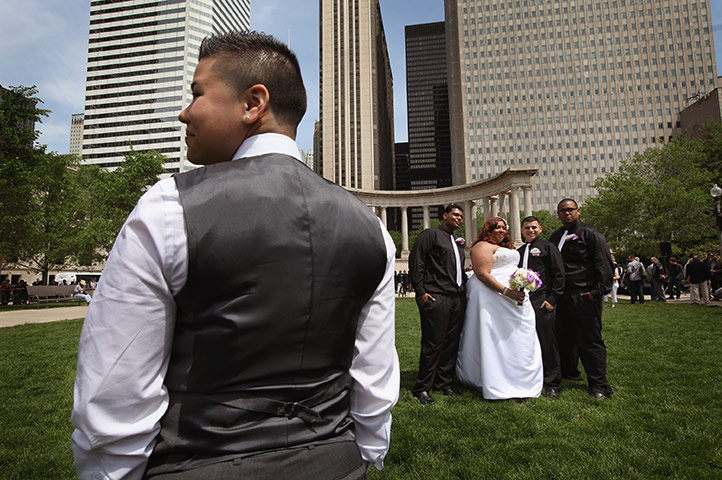 24 hours in pictures: civil union ceremony held for gay couples in chicago