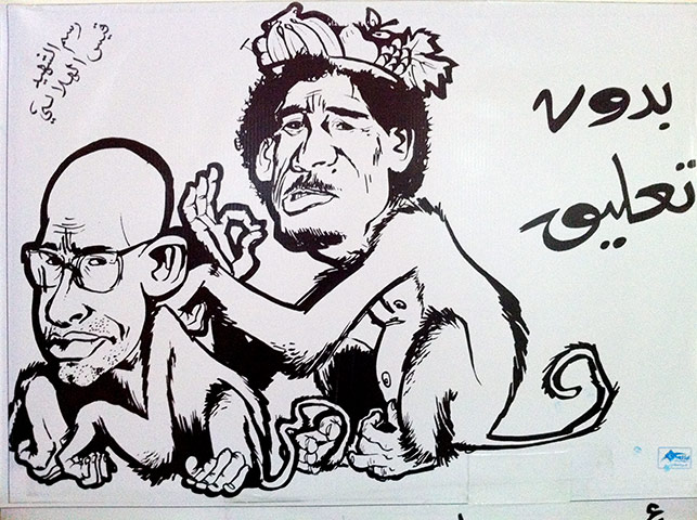 Gaddafi street art: Monkey