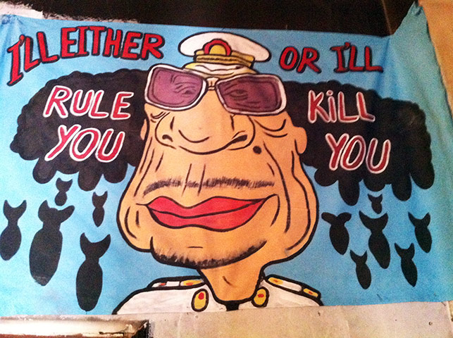 Gaddafi street art: I'll either rule you or I'll kill you