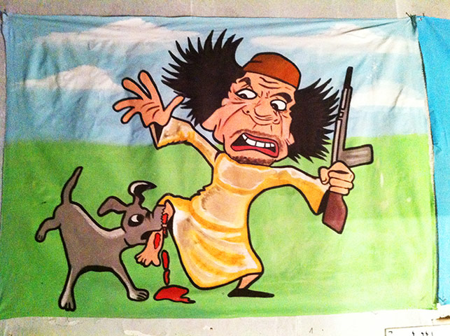 Gaddafi street art: Dog bite