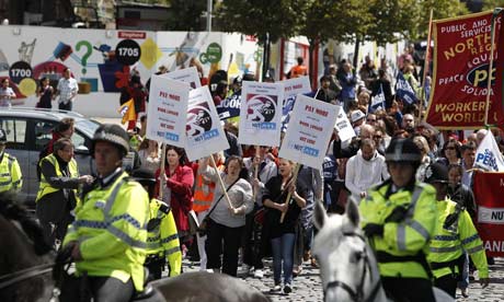 Protesters march through Liverpool as part of a one day national strike