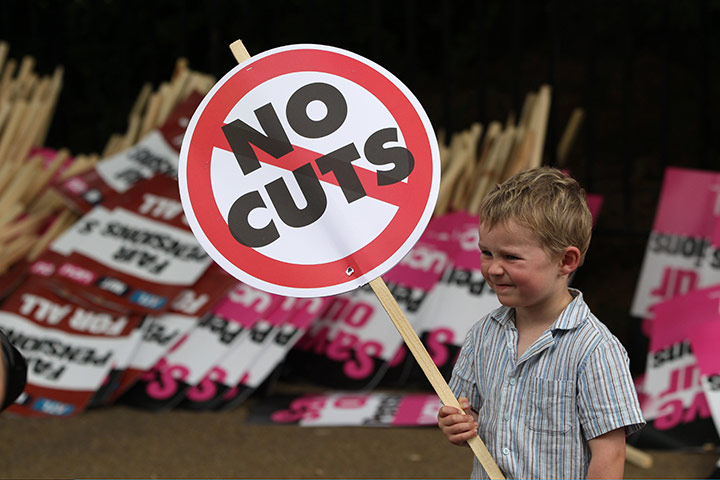 Public sector strikes: A young boy prepares to take part in a march with public sector workers