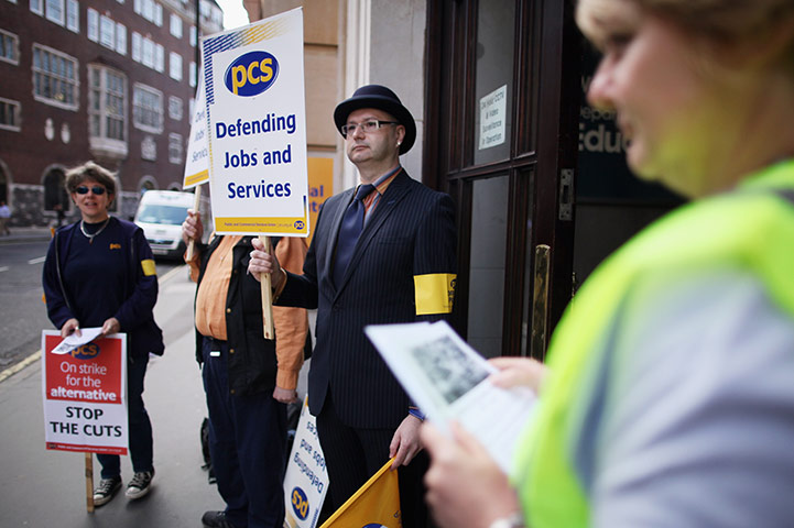 Public sector strikes: Union members hold a placards outside the Department for Education building