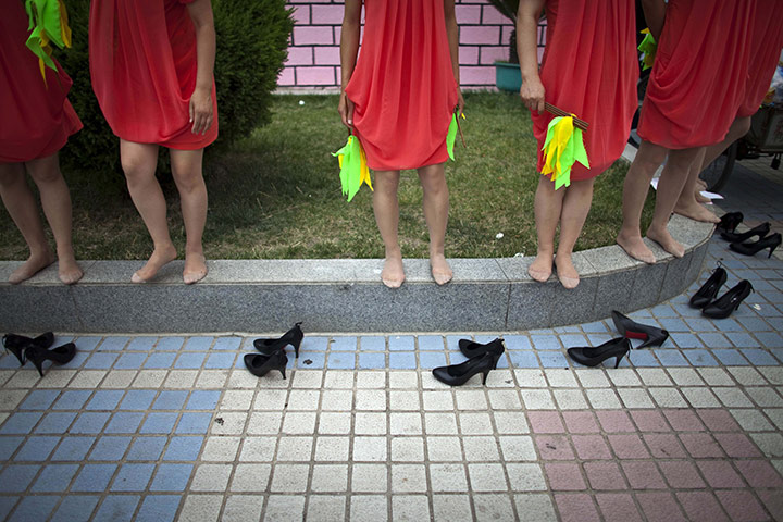 24 hours in pictures: patriotic song contest Yan'an, China