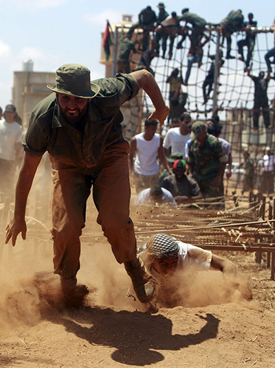 24 hours in pictures: New rebel recruits undertake training in Libya