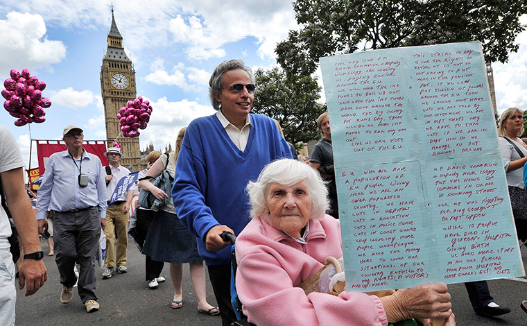 National strikes: An elderly woman protests outside parliament