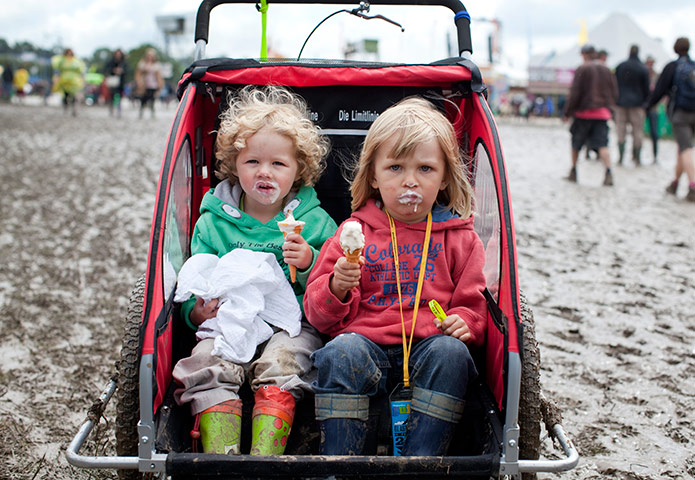 Glastonbury: Children being being pushed toward John Peel stage, Glastonbury festival