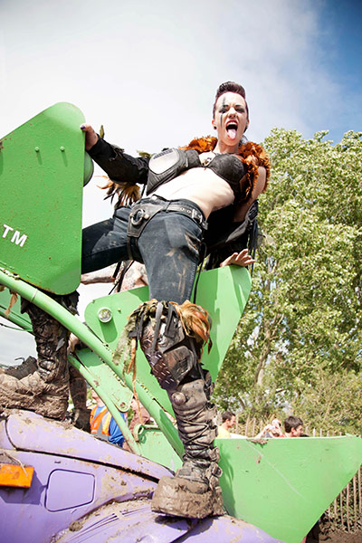 Glastonbury 2011: Arcadia dancers parade through the festival