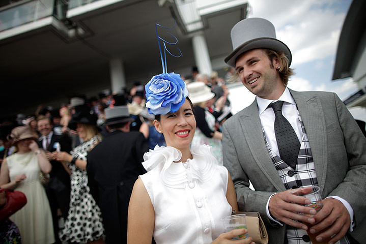 Day at the Epsom Races: Race goers enjoy the Epsom Derby