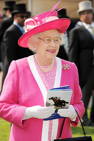 Day at the Epsom Races: Race goers enjoy the Epsom Derby