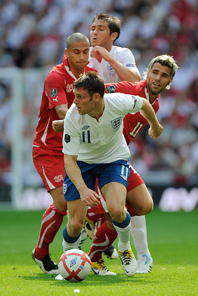 England v Switzerland: James Milner escapes with the ball in front of Inler, Behrami and Lampard