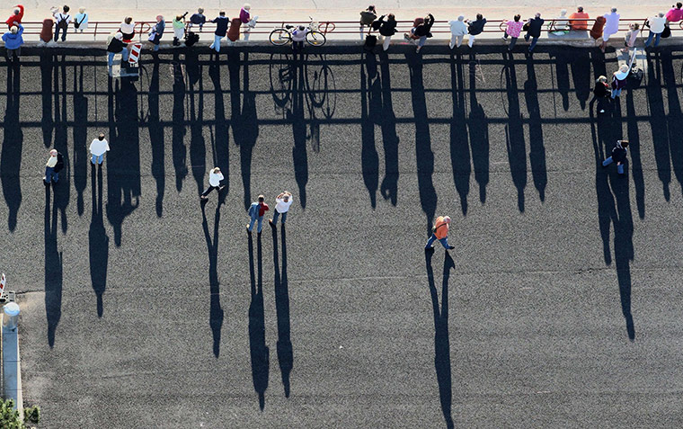 24 hours in pictures: Spectators watch the arrival of luxury cruise liner, Germany