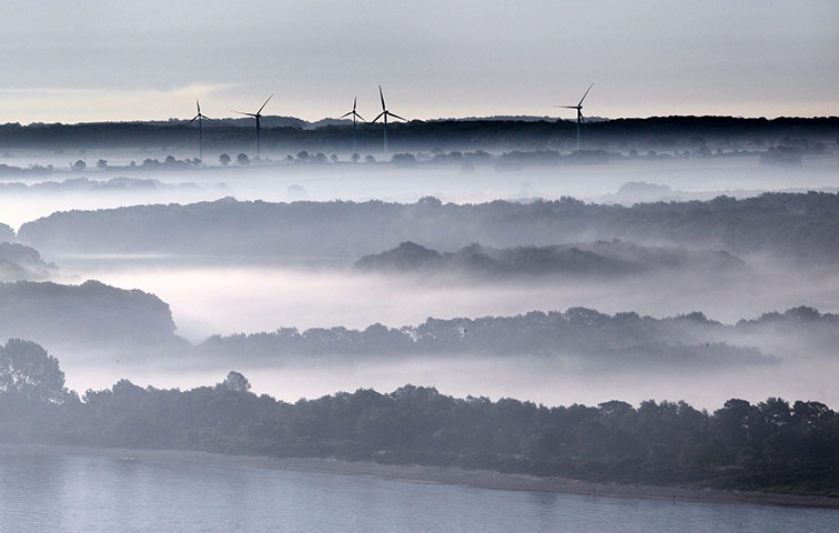 24 hours in pictures: Mist wafts over fields near Dassow, Germany