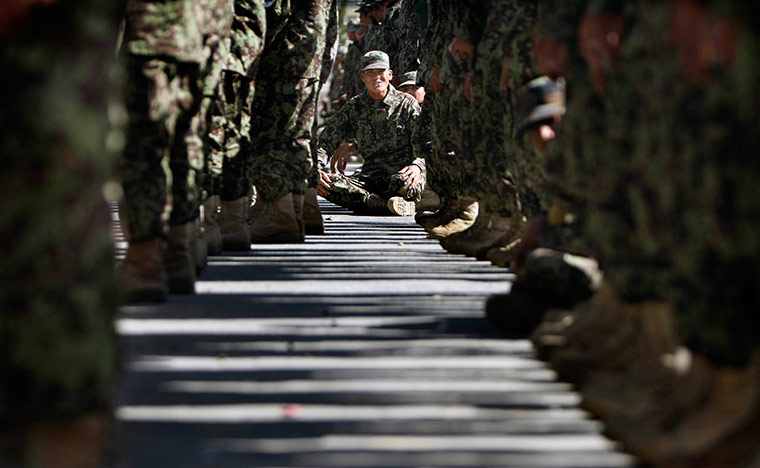 24 hours in pics: Newly trained soldiers of Afghan army during a ceremony