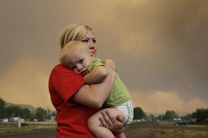 Arizona Wildfires: Emily Shupe comforts her 18-month-old son Jax