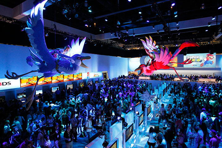 E3 expo: Attendees walk at the Nintendo booth, E3 expo