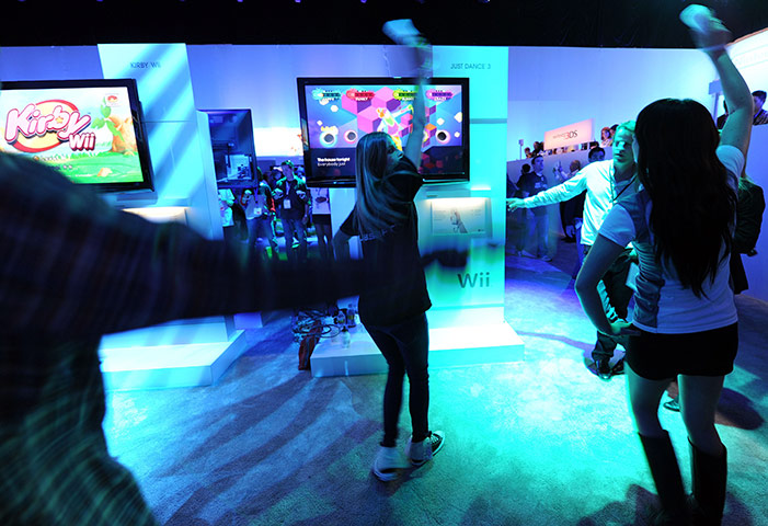 E3 expo: Gamers play video games during the Electronic Entertainment Expo
