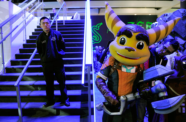 E3 expo: A security guard looks on as the character 