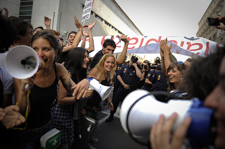 24 hours: Madrid, Spain: Hundreds of protesters demonstrate outside parliament