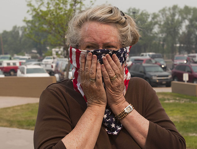 Arizona Wildfires: Kay Dyson covers her face