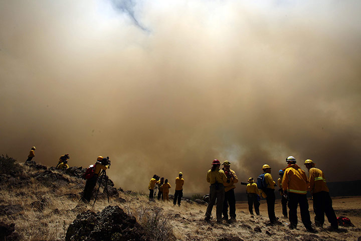 Arizona Wildfires: Members of the media watch the Wallow Fire