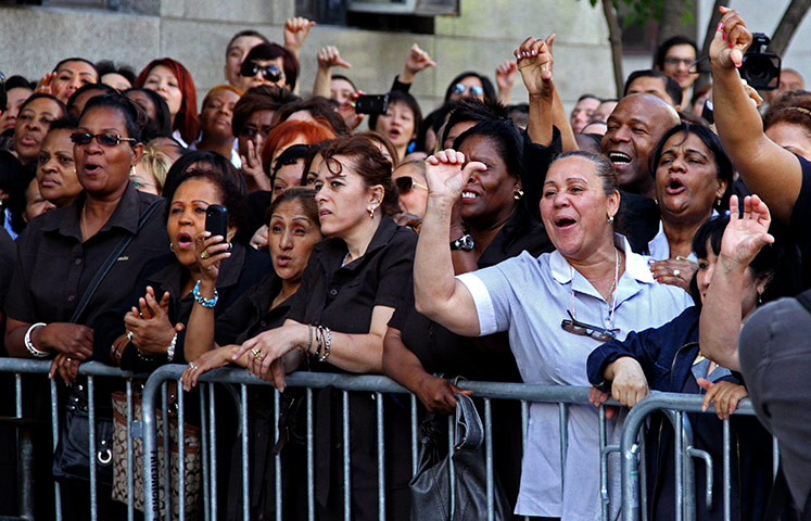 Week in Business: Hotel workers from New York hotels jeer Dominique Strauss-Kahn 