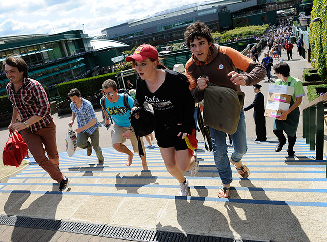 Wimbledon day 11: Tennis fans rush to get the best spots on Murray Mount