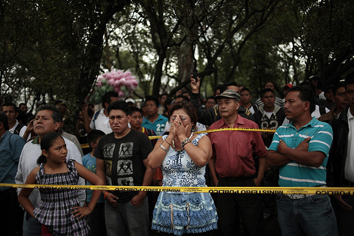 24 hours: Guatemala City, Guatemala: People react where Facundo Cabral was shot