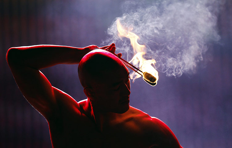  24 hours: Shanghai: A contestant performs with fire during China's Got Talent