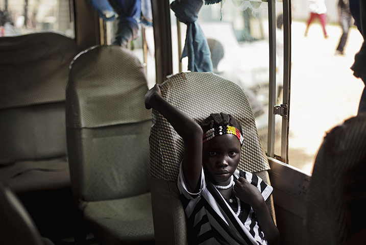 FTA: David Azia: A youth sits in a bus following rehearsals for independence celebrations