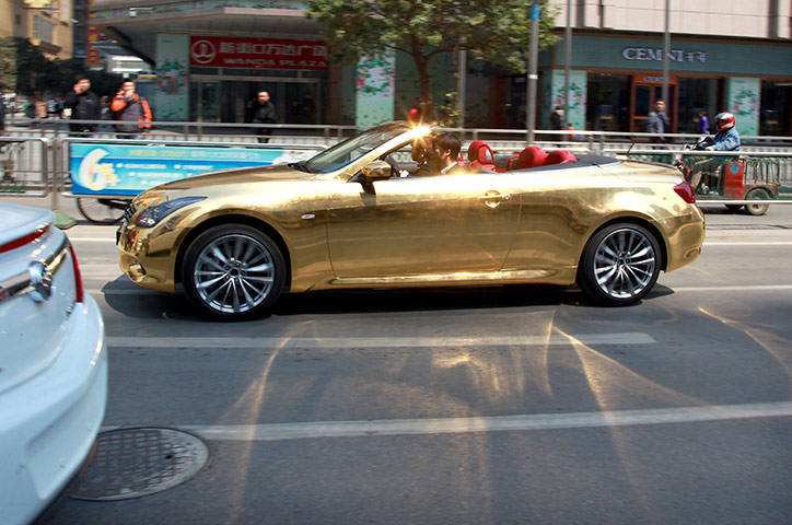 Luxury cars in China: A gold-plated Infiniti luxury sports car in Nanjing