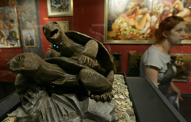 Moscow sex museum: A visitor passes exhibits at the Tochka G Erotic Arts Museum, Moscow