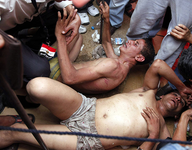 24 hours in pictures: protesters in Tahrir Square