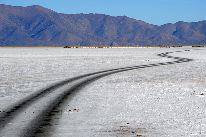 24 hours in pictures:  A road winds through a salt pan in Argentina