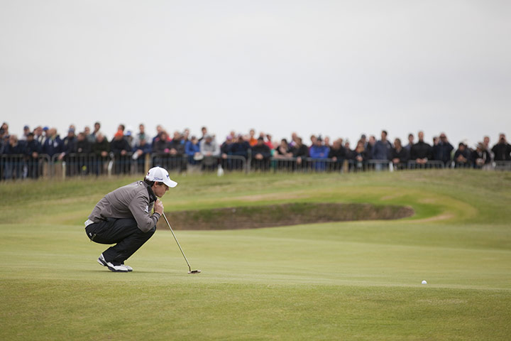 The Open: Rory McIlroy lines up a putt on the 4th