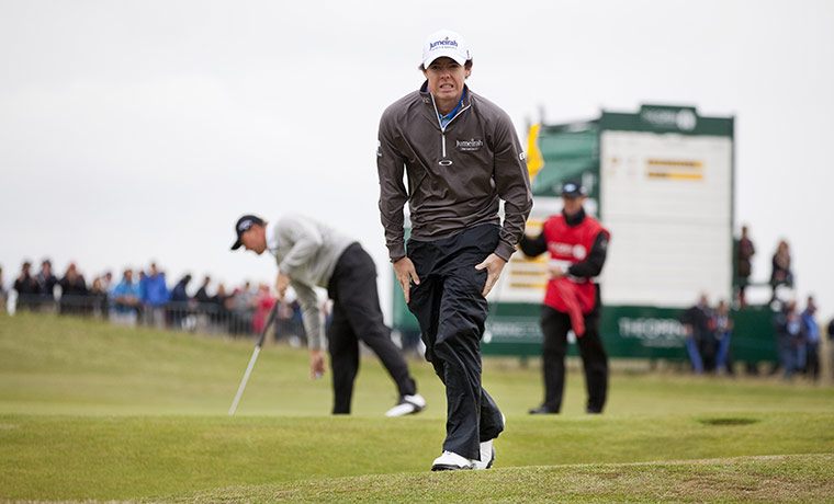 The Open: Rory McIlroy leaves the 4th green after parring the hole