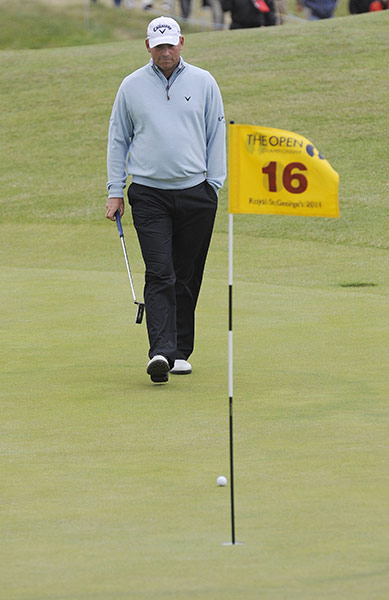 The Open: Thomas Bjorn walks onto the green to his tee shot on the 16th green