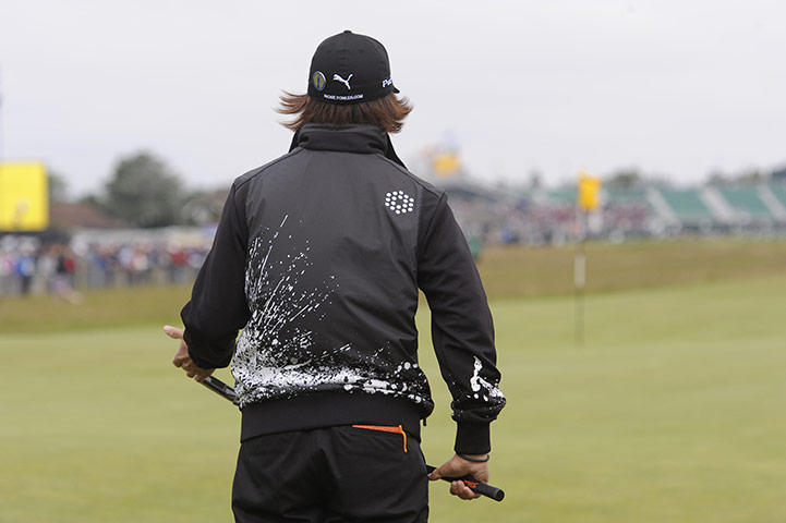 Open Golf: Rickie Fowler lines up his huge birdie putt on the 1st green