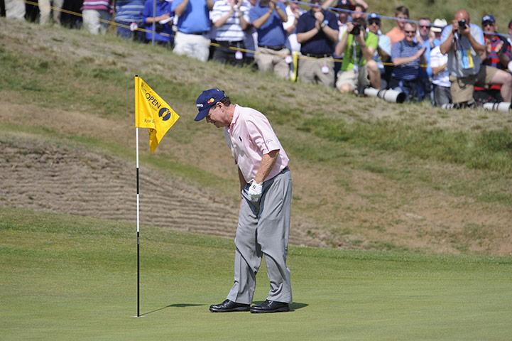 Tom Watson Hole in One: Tom Watson looks into the hole to see his ball
