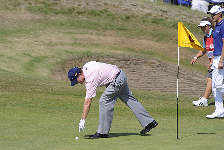 Tom Watson Hole in One: Tom Watson picks the ball up after dropping it