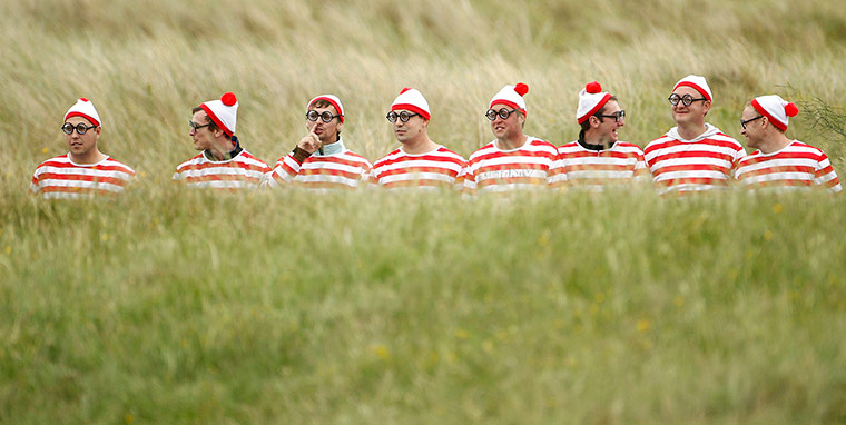 24 hours in pictures: Spectators in Where's Wally fancy dress at British Open Golf Championship