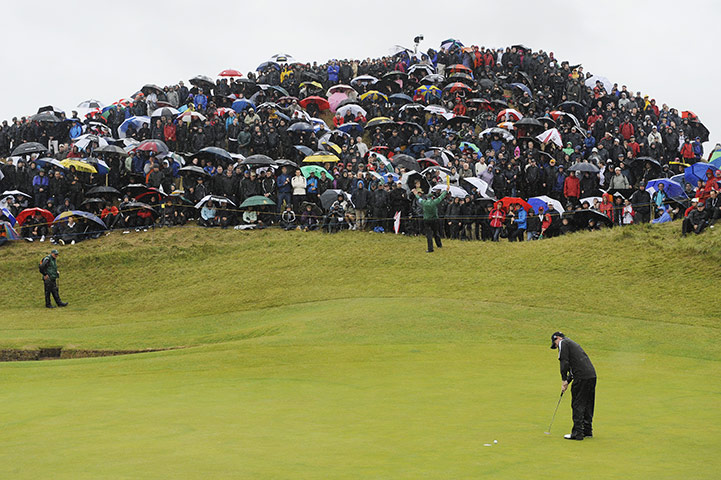 Day Three Open Jenkins: Rory McIlroy holes a par putt on the 6th. British Open Golf day three