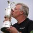 Open day 4: A jubilent Darren Clarke plants a kiss on the old Claret Jug