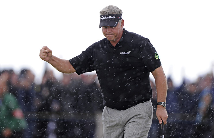 Open day 4: Darren Clarke celebrates an eagle on the 7th