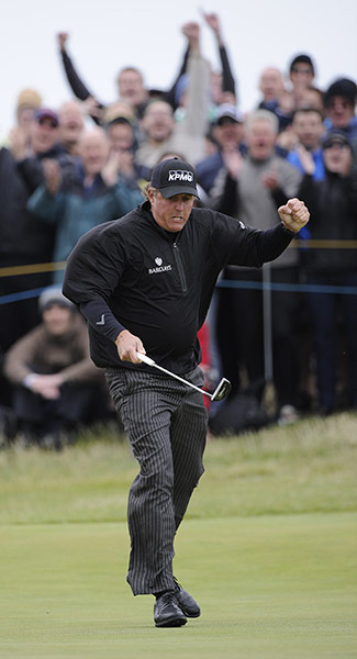 Open day 4: Phil Mickelson celebrate as he holes an eagle on the 7th
